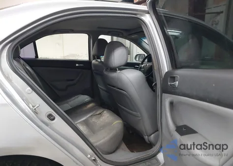 2004 Acura Tsx z USA, uszkodzony, nr VIN JH4CL96834C012507